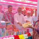 নওগাঁর মহাদেবপুরে শারদীয়া দুর্গোৎসব উপলক্ষ্যে বস্ত্র বিতরণ